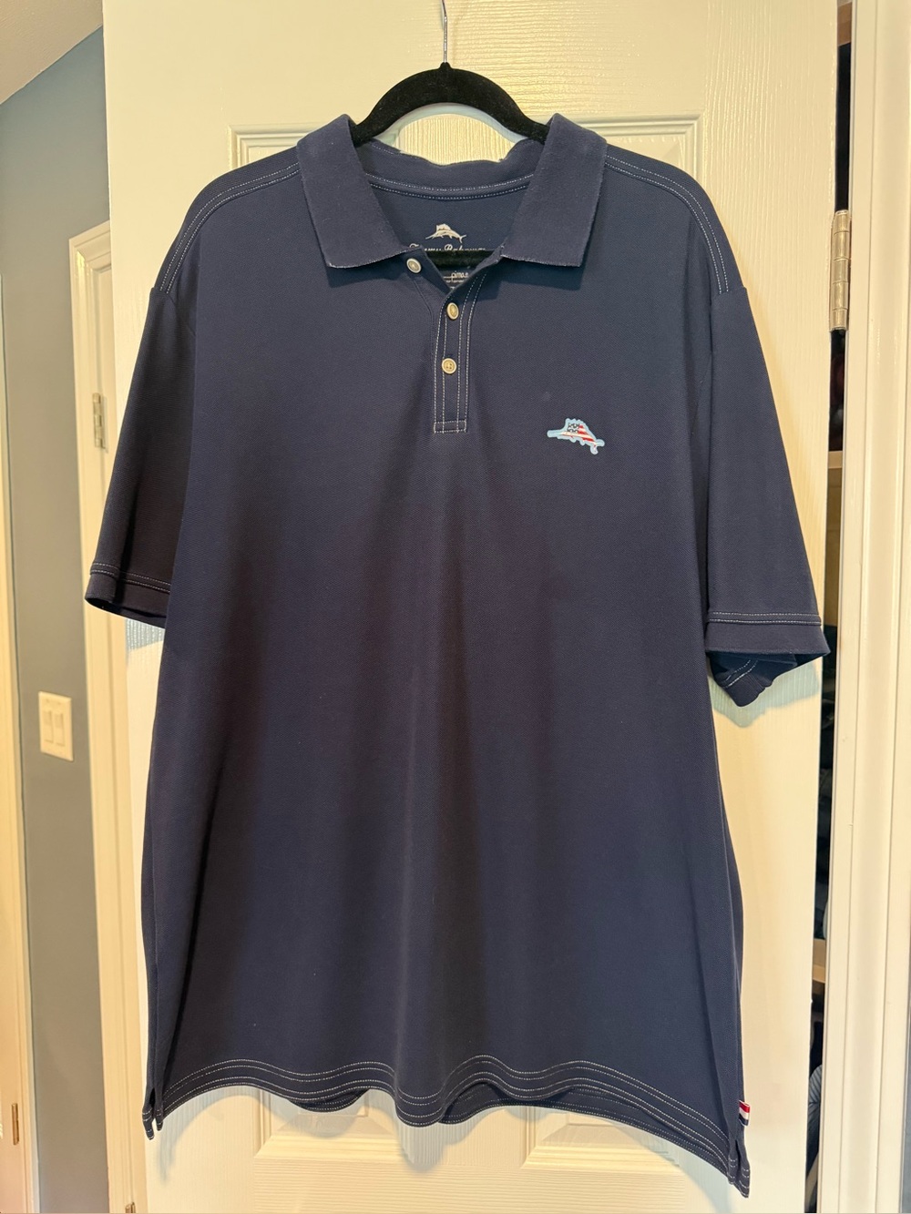 Tommy Bahama Navy Polo with Small Embroidered USA flag Fish Logo